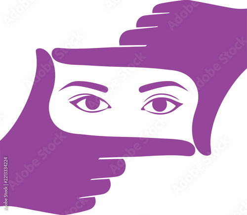 Hands framing a pair of eyes, symbol of focus, perspective, and vision