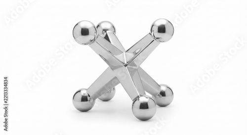 Shiny silver metal jacks piece with six rounded balls, isolated on a white background. Classic children's game and nostalgic toy.

