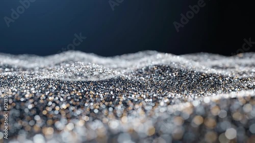 Abstract waves of glowing golden particles flowing across a dark background