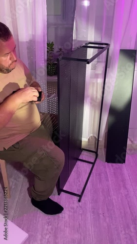 a man assembles a metal cabinet