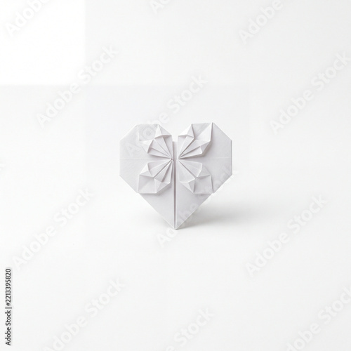9 White Origami Paper Hearts in Circular Frames Grid