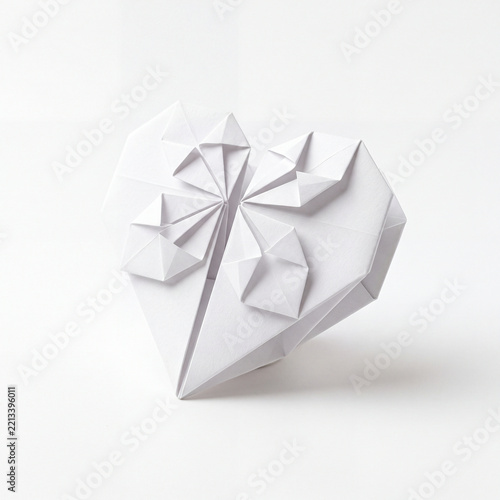 Set of Nine White Origami Paper Folded Hearts in Circular Grid Layout