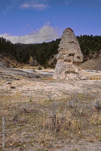 Liberty Cap at Mammoth Hot Springs, 11-m-tall (37 foot) mineral cone, remains of an extinct spring flowing there for long. Yellowstone NP-WY-USA-022