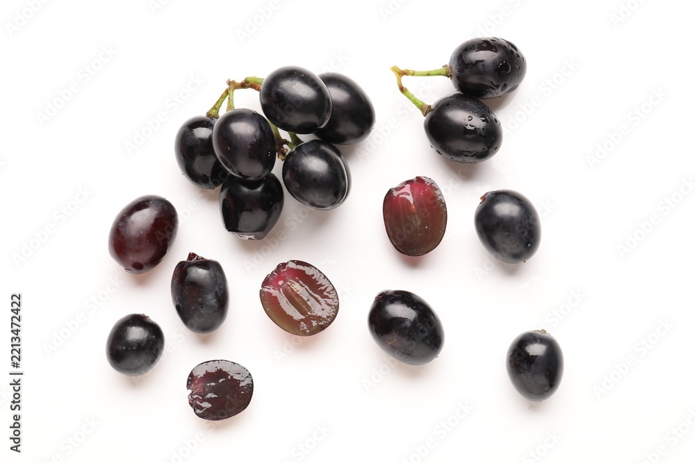 Fototapeta premium Fresh ripe grapes on white background, flat lay