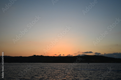 Coucher de soleil depuis la mer à Malte