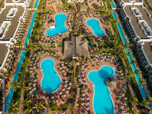 Top down aerial view of swimming pools at luxury resort on Sal island Cape Verde
