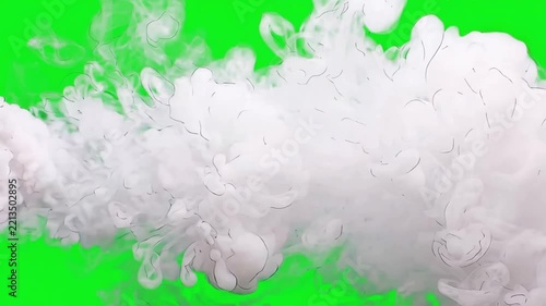 White smoke drifting across a vibrant green screen background for video compositing