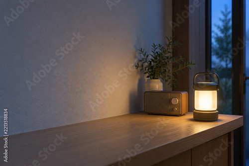 Emergency lantern and radio prepared at home during winter evening