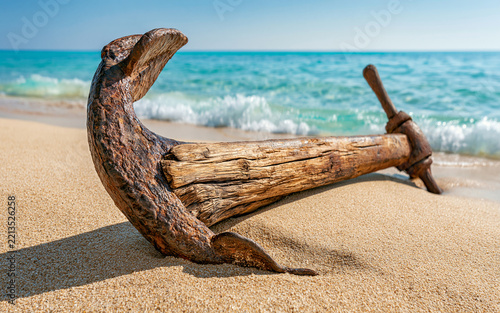 Vintage Admiralty Anchor on a Sunny Sandy Beach with Ocean Waves