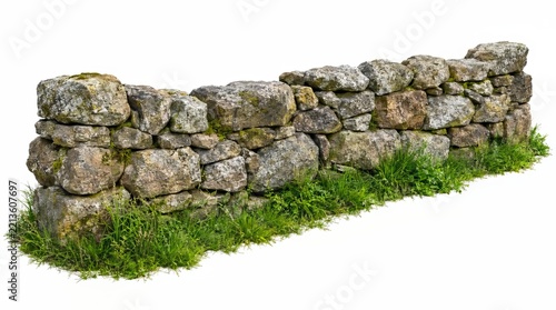 Dry stone wall section with green grass and rocks