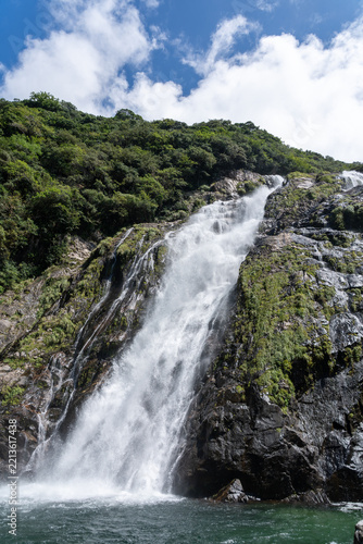 Towering View of Oko Waterfall and Emerald Basin