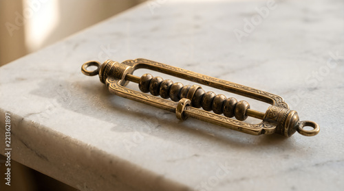 Ramadan prayer beads on a marble surface