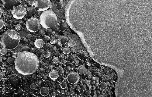 Extreme closeup of grease congealed in the bottom of a frying pan.