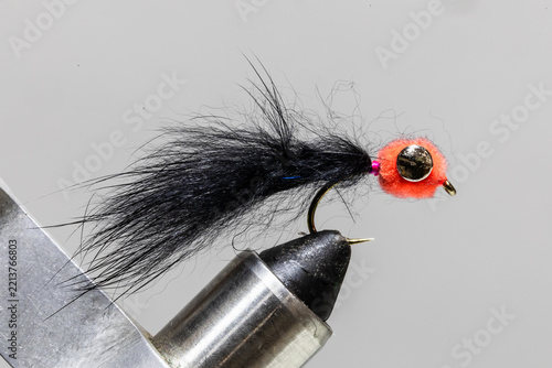 Egg sucking leach marabou fly on a tying vice ready to take fishing for steelhead
