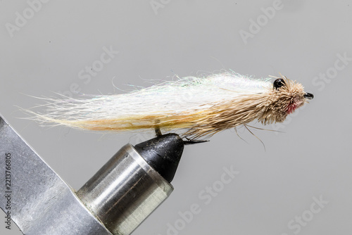 Mouse muddler wake skater skating fly on a tying vice ready to take fishing for steelhead