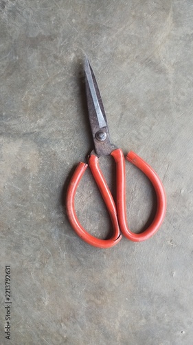 electrical cable on a wall, old scissor