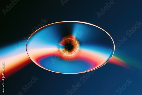 Futuristic optical disc with chromatic aberration and light leaks