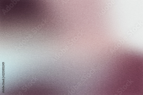 Abstract background blending colorful gradients with subtle grainy texture and soft blur