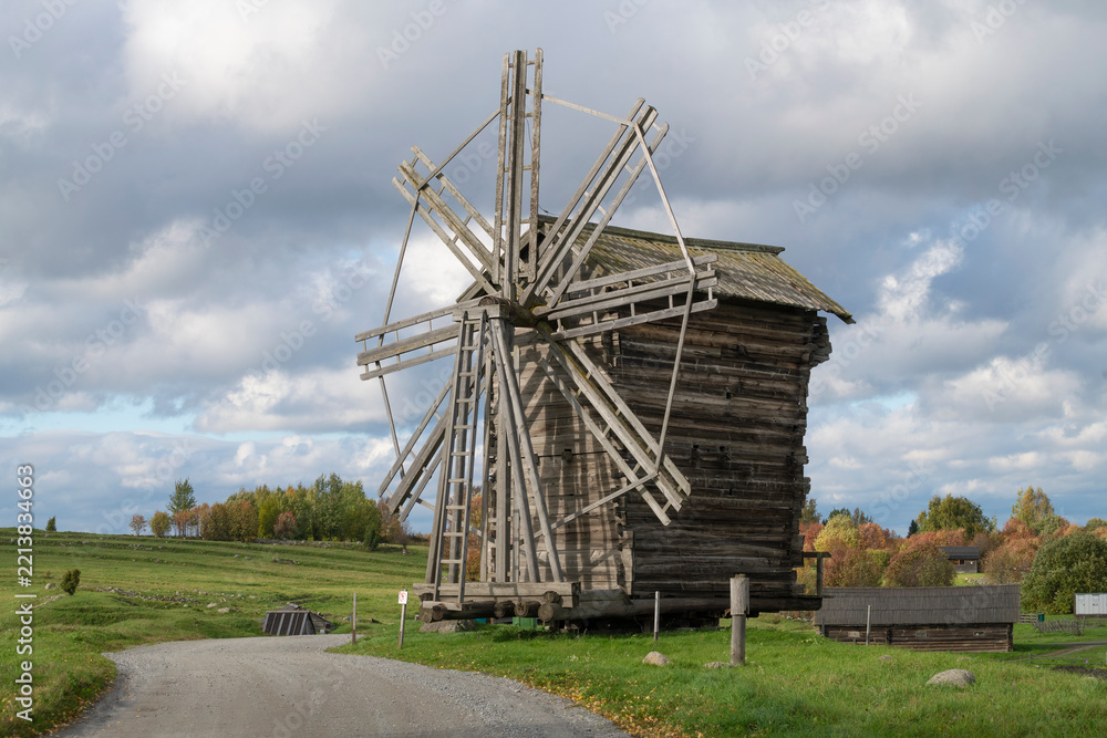 Obraz premium Od wooden windmill on a September afternoon. Karelia