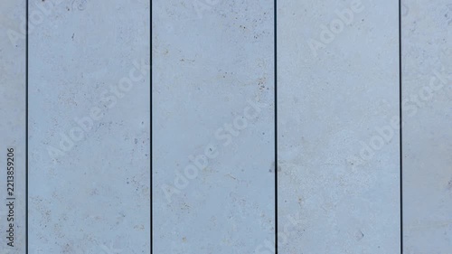 Pale blue concrete wall panels texture