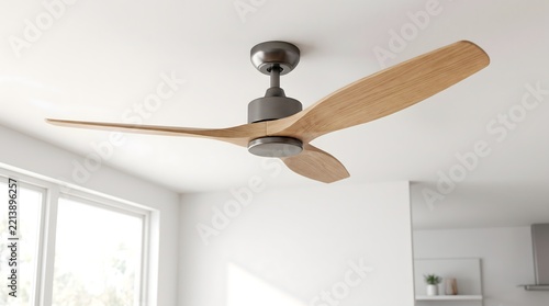 Sleek modern ceiling fan with wooden blades mounted on a white ceiling, ideal for home appliance and interior design content.