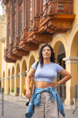Young woman exploring historic lima city architecture