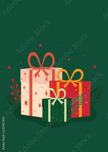 Colorful Christmas gift boxes with ribbons, stars and decorative branches on a green festive background.