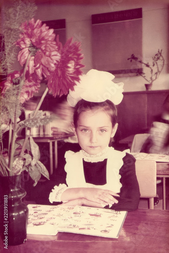 Soviet schoolgirl celebrates first school day in 1991 USSR classroom