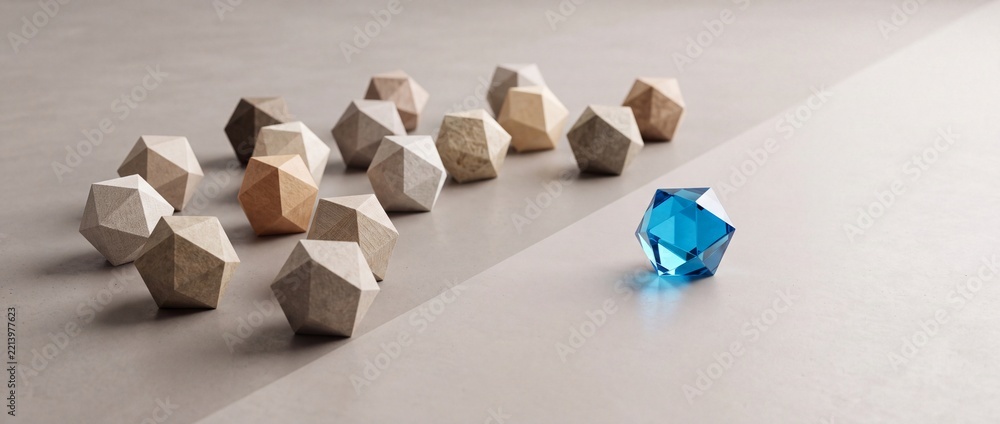 Fototapeta premium Concept of Uniqueness and Leadership Featuring a Single Blue Crystal Geometric Shape Standing Apart from a Group of Plain Stone Textured Polygons on a Minimalist Surface Background