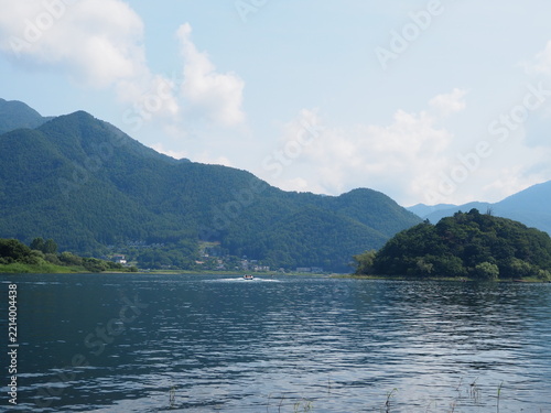 Scenic summer view of Lake Kawaguchi with Lake Island Unoshima in Yamagata Japan