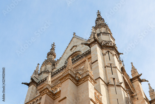 Gothic Spires and Gargoyles of Sainte-Chapelle Against Blue Sky, Medieval Architecture in Paris, France
