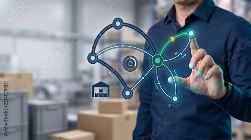 Business professional interacting a digital logistics network interface in a warehouse with copy space layout