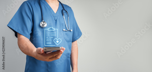 Healthcare professional doctor using smartphone with real-time patient metrics and risk data. Digital monitoring, clinical decision support, connected care and mobile health technology concepts.