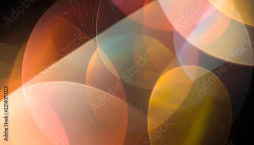 Cinematic Golden Lens Flare with Floating Dust Particles and Warm Light Leak Texture for Background Overlay