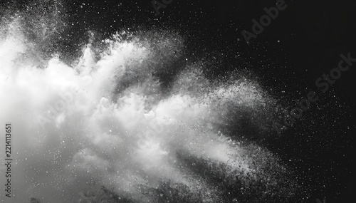 Winter blizzard spray overlay. White snow powder explosion. White snow blowing in wind against black background. Snowdrift with swirling powder .