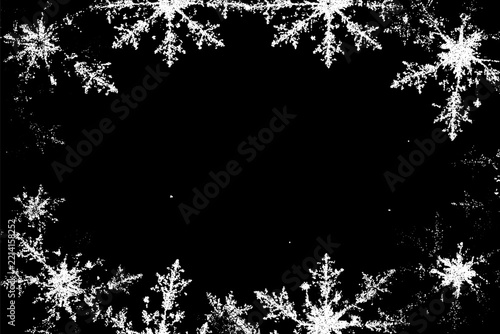 Christmas snowflakes frame in retro dotwork style. Border of winter snow in vintage style.
