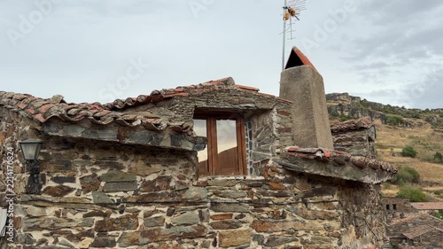Patones traditional slate stone house facade in patones, spain