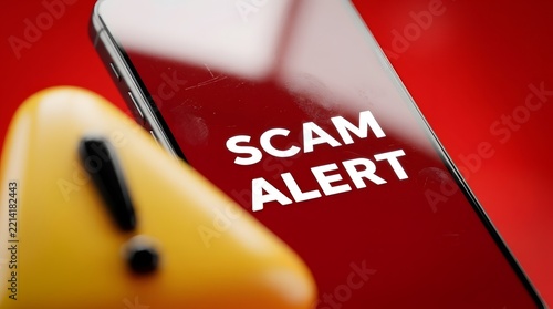 Scam alert message displayed on a smartphone screen with a blurred yellow warning triangle and exclamation mark in the foreground against a red background.