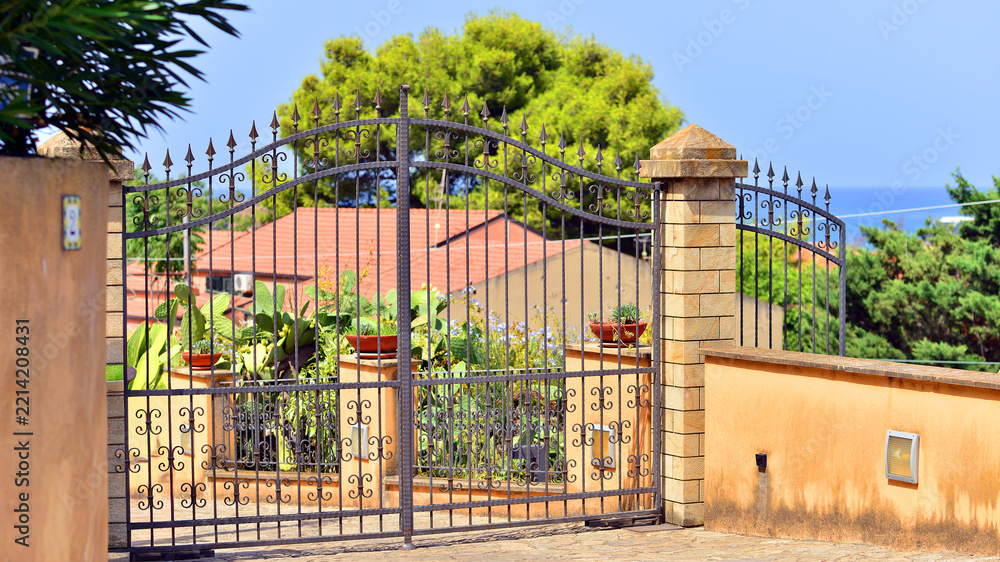 Fototapeta premium Single-family housing surrounded by greenery