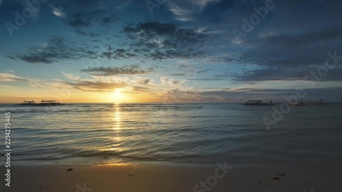 Vibrant sunrise over sea with clouds and waves, beach scene, peaceful nature, Philippines, 4k