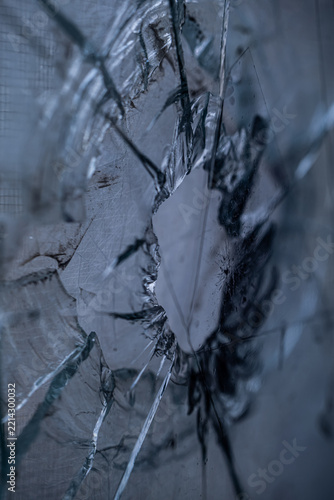 Fotografie Window shattered by a shell fragment in Severnaya Saltovka district in Kharkiv,