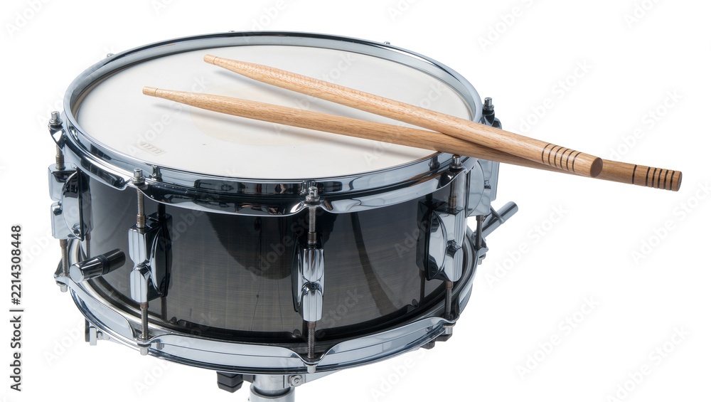 Obraz premium Black snare drum with wooden drumsticks, isolated on transparent background