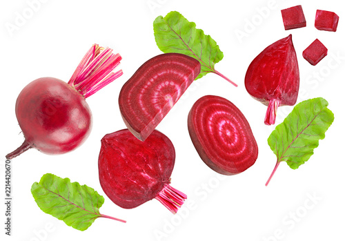 flying beetroot with pieces of beetroot and green leaf isolated on white background. clipping path