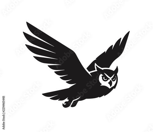 Minimalist black owl silhouette in flight isolated on transparent background