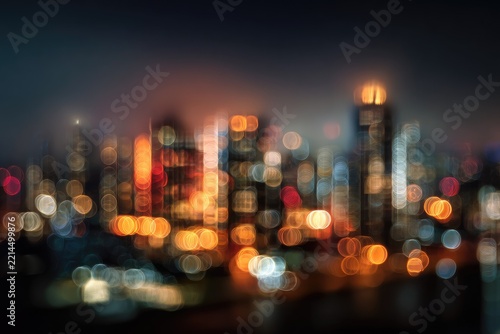 Blurred nighttime cityscape, bokeh lights