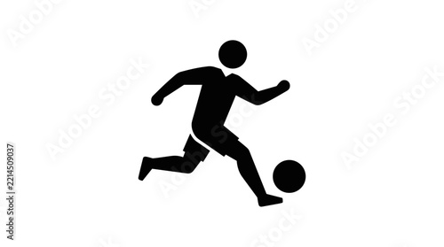 Silhouette of a soccer player kicking a ball.