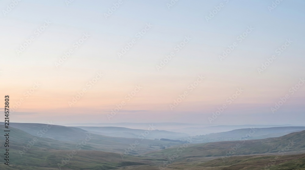 Fototapeta premium A serene landscape showcases a vast valley stretching into the distance.