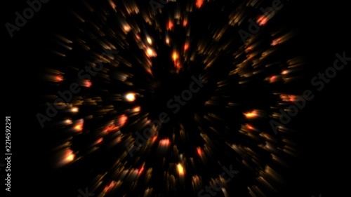 Golden orange light burst and glowing particles on black background, dynamic energy effect
