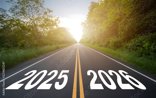 Empty highway stretching toward a bright sunrise with large 2025 numbers marking the road