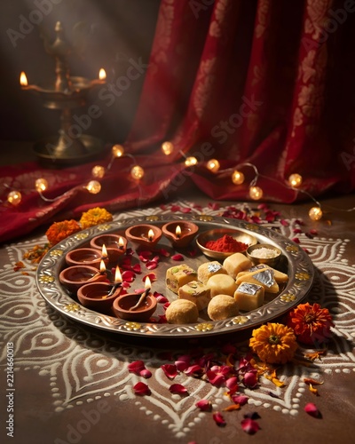 Luxurious Happy Bhai Dooj Greeting with Diwali Lamps and Sweet Delicacies